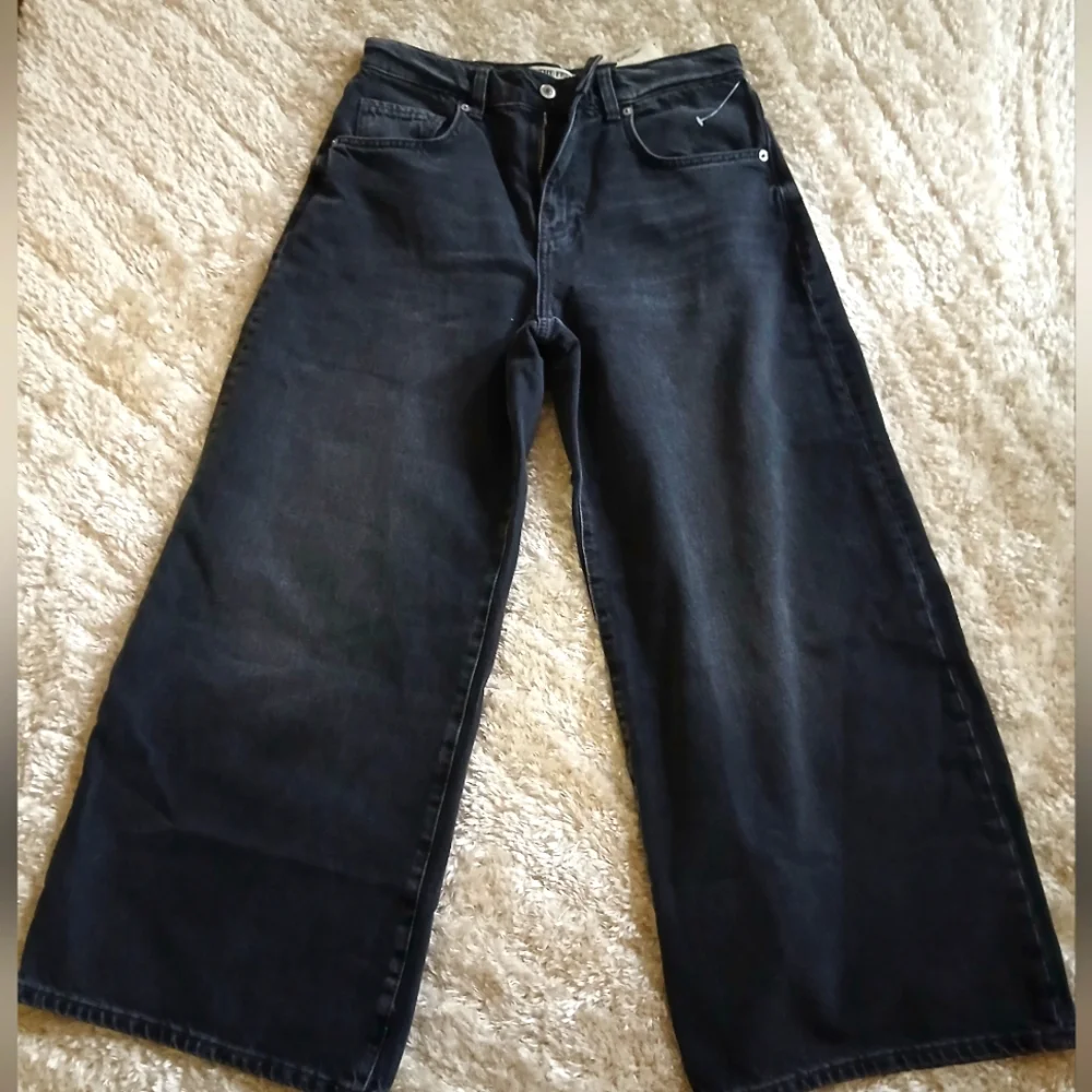 FREE PEOPLE dark washed jeans